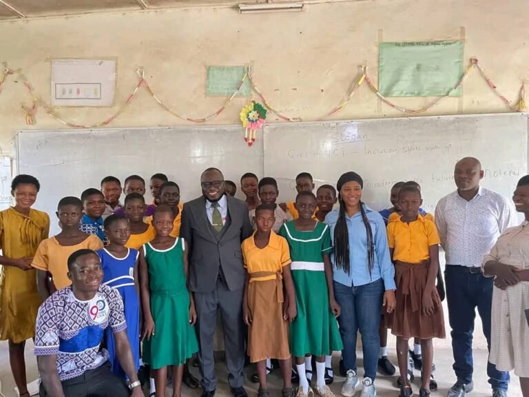 Hon. Peter with Basic school girls